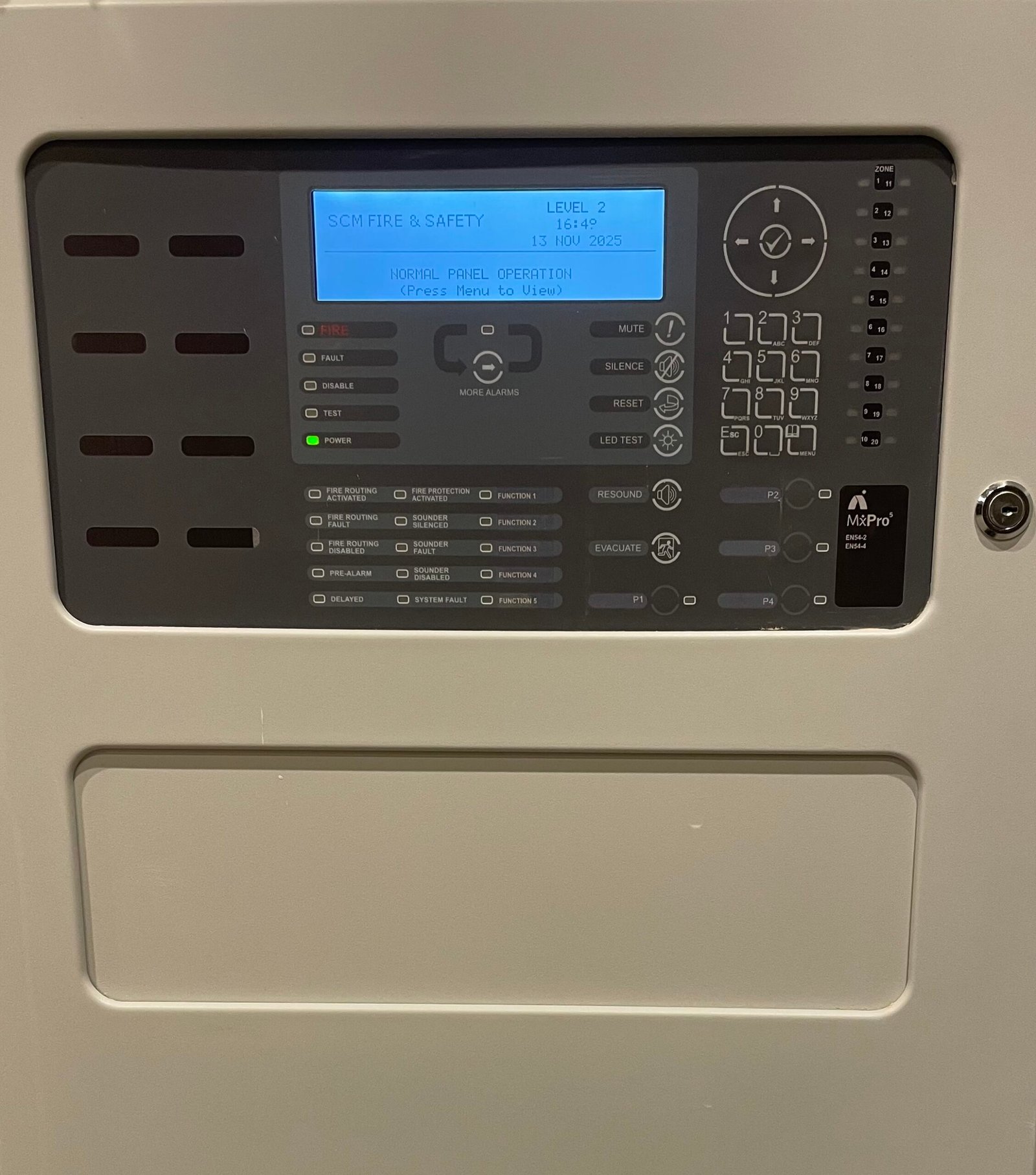 Hotel fire alarm panel with SCM label
